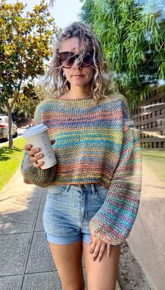 🖤This sweater is made to order, so I will begin knitting it once you place your order! For this reason, please allow up to two weeks for production and shipping 🖤 This vibrant, hand-knit sweater features a mix of colorful rainbow stripes with a relaxed, oversized fit. Made with breathable, lightweight yarn, it's perfect for layering over casual outfits or wearing as a stylish beach cover-up. The loose-knit design and wide balloon sleeves give it a cozy, boho vibe, making it a must-have for coo Casual Multicolor Crew Neck Cropped Sweater, Casual Multicolor Cropped Sweater With Crew Neck, Casual Multicolor Knitted Cropped Sweater, Casual Long Sleeve Knitted Cropped Sweater, Casual Long Sleeve Knitting Pattern, Casual Knit Knitting Pattern, Casual Multicolor Knitting Pattern For Fall, Casual Knitted Cropped Sweater For Fall, Casual Cropped Fall Sweater