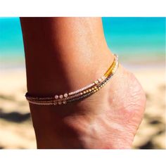 Hard-wearing, multi-strand Japanese seed bead anklet with white waterproof cord with gold, silver and white sparkling beads.  Fully adjustable (22-30cm) with slip-knot. 🌊 🏊✅ Pool & ocean proof.  📦✅ Shipped FREE in the UK and dispatched on the SAME DAY where possible. 🎁✅ Gift wrap option available.  Visit our Etsy site to view other Ben's Beach jewellery --> https://www.etsy.com/uk/shop/BensBeach 🌐 Visit our main site --> https://bensbeach.com/ to view our wider selection and subscribe for u Gold Strand Beaded Bracelets For Summer, Gold Beaded Anklets For Beach, Gold Anklets With Beads For Summer, Beaded Gold Anklets For Summer, Elegant Beaded Bracelets With Gold Beads For Beach, Gold Anklets With Tiny Beads For Beach, Summer Beaded Gold Anklets, Gold Anklets With Colorful Beads For Summer, Elegant Gold Beaded Bracelets For The Beach