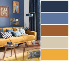 a living room with blue walls and yellow furniture in the color scheme, including mustard