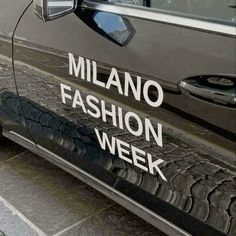 there is a car that has the words milano fashion week on it's side