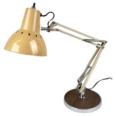 a desk lamp with a wooden base and metal arm, on an isolated white background