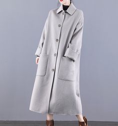 Product Description: handmade Cashmere coat high grade fabric,cashmere fabric.also could be custom made with any size and other colors,please feel free to contact with me if you want custom it. Material: wool 80%- 90% Size: S: Bust : 116 cm shoulder and Sleeve:76cm Length:115cm M: Bust : 120 cm shoulder and Sleeve:77cm Length:115cm L: Bust : 124 cm shoulder and Sleeve:78cm Length:115cm XL: Bust : 128 cm shoulder and Sleeve:79cm Length:115cm Shipping we ship worldwide the USPS takes about 15 days Solid Single-breasted Long Wool Coat, Luxury Long Wool Coat With Double-breasted Button, Elegant Long Wool Coat With Double-breasted Button Fastening, Elegant Blue Double-breasted Wool Coat, Blue Double-breasted Wool Coat With Button Closure, Cashmere Coat, Wool Coat, Custom Made, Duster Coat