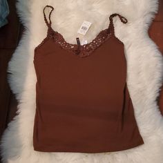 Crochete Trim Camisole. Chocolate Brown. Measurements Pit To Pit 16", Lenght Pit Down 16", Lenght Shoulder Down 27" (13) Brown Cami Top For Spring, Casual Brown Stretch Camisole, Brown Spring Camisole, Spring Brown Camisole, Brown Spaghetti Strap Tops For Spring, Spring Brown Spaghetti Strap Tops, Casual Brown Camisole Top, Casual Brown Camisole With Tank Straps, Brown Stretch Cami Top