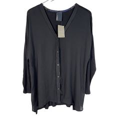 New! Dolan T-Shirt Anthropologie Sheer Front Button Up Blouse Size L Black This Shirt Is Solid Black, With The Front Being A Sheer Material, And The Back Being A Burnout Style Having Some Slightly Sheer Parts. The Front Is Shorter Than The Back Of The Top, It Buttons Down The Front, And Has A Flowy Look To It! It Could Easily Be Dressed Up Or Down! Long Sleeve, Drop Shoulder, Stretch, Made In Usa. Condition: New With Tag. No Flaws! Size: Large Underarm-To Underarm: 23" Length: 29" Materials: Ray Black Casual Shirt For Layering, Casual Black Shirt For Layering, Black Relaxed Fit Tops With Buttons, Workwear Tops With Shirttail Hem And Buttons, Tops With Button Closure And Shirttail Hem For Daywear, Black Blouse With Shirttail Hem For Daywear, Black Button-up Shirt For Layering, Black Buttoned Blouse For Layering, Relaxed Fit Blouse With Button Closure For Layering