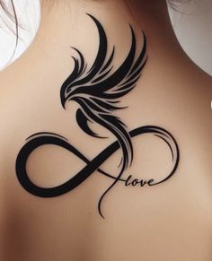 the back of a woman's neck with a tattoo on it that says love