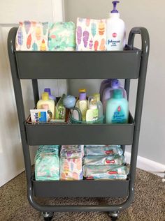 three tiered cart filled with baby products