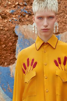 Over sized, long sleeves shirt, flat pockets with silk thread hand embroidery along the the shirt collar ' ders '. Wheat ears are hand embroidered with pear cotton DMC thread above the pockets.The buttons are hand woven with silk thread.The fabric very light and airy cotton with a lovely feel to the touch Traditional Long Sleeve Blouse With Woven Motifs, Summer Workwear Blouse With Embroidered Cuffs, Festive Long Sleeve Embroidered Shirt, Long Sleeve Shirt With Embroidered Cuffs For Summer, Traditional Long Sleeve Blouse With Embroidered Cuffs, Traditional Collared Summer Blouse, Traditional Collared Blouse For Summer, Summer Long Sleeve Blouse With Embroidered Cuffs, Festive Long Sleeve Blouse With Embroidered Cuffs