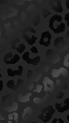 an animal print wallpaper with black and grey colors