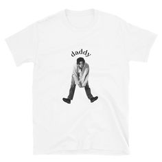 a white t - shirt with the words daddy on it and an image of a man sitting