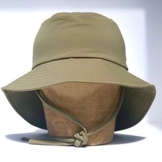 Designed with the boys in mind (but most definitely gender neutral), the stylish yet super practical fini. sailor hat in Khaki is made from soft textured cotton, has an extra wide brim with long back for increased sun protection. Button the brim sides up for the super cool sailor look Keep the brim sides down & flip up the front for a trendy casual look Keep this gorgeous hat it in its natural style with the full brim down for ultimate sun protection Multiple ways to style to suit every bebe! *d Hat Business, Sailor Hat, Baby Turban, Hand Dyed Fabric, Coconut Shell, Natural Style, Fabric Texture, Hat Making, The Boys