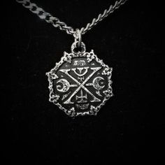 This Sigil of Murmur necklace is an handmade pewter sculpture This seal of Murmur is one of the 72 Sigils of Goetia from Ars Goetia's DemonologyThis Sigil of Goetia pendant is sold with a stainless steel chainThis Seal of Murmur is a pendant of 2.5cm diameterThis Sigil of Murmur is a pewter sculpture of my own creation, i create and work the metal by myself at home. The material used is the finest and highest grade hypoallergenic pewter alloy of 98%tinYou can combine many of my creations in an o Handmade Gothic Antique Silver Necklace, Antique Silver Medieval Jewelry With Oxidized Finish, Medieval Style Metal Necklaces For Larp, Medieval Jewelry In Antique Silver With Oxidized Finish, Gothic Engraved Antique Silver Necklace, Medieval Style Metal Engraved Necklaces, Medieval Black Metal Necklace, Medieval Style Black Metal Necklace, Gothic Metal Necklace Engraved