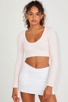 Guaranteed serve. Features - Deep V-neck - Seamless - Wide ribbed elasticized band Size & Fit - Fit: Fitted - Length: Cropped - Model is wearing size S Materials & Care - Content: 55% nylon, 40% viscose, 5% spandex - Care: Machine wash, cold - Imported Club Streetwear, Prom Dresses Boho, Swimsuit Dress, Prom Dresses Long With Sleeves, Crop Top Blouse, Long Maxi Dress, Long Sleeve Maxi Dress, Deep V Neck