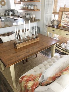 a living room filled with furniture and decor