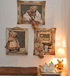 two teddy bears are hung on the wall