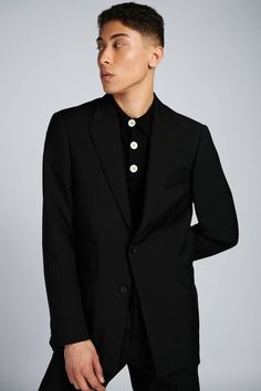 Overview:Made from 100% extra-fine merino wool. This black long-sleeve polo shirt features 3 shell pearl buttons Highlights:- Black Merino Wool- Concealed placket- Ribbed collar, cuffs, and waistband- 3 shell buttons- Gender-neutral Size & fitting:- Model measures: Height 1.86cm; Chest/Bust 93cm; Waist 77cm; Hip 93cm- Model wears a size M Info & Care:- Merinos Extrafine Wool 100%- Hand wash About the brand: At Mercader, we anticipate a movement in fashion on the impact of Seasonless, Genderless, Aviator Leather Jacket, Mens Designer Clothes, Shirt Embroidery, Long Sleeve Polo Shirt, Pearl Buttons, Long Sleeve Polo, Men Clothing, Slim Fit Jeans, Black Long Sleeve