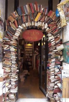 an archway made out of books is shown