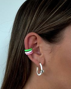 Style an effortless ear scape with our new enamel ear cuffs - no piercings required! Slide them onto the narrowest part of your ear and adjust accordingly; the cuff grips onto your ear and is comfortable for extended wear. Perfect to wear alone or stacked with multiple for a statement look. Extra cute when styled with our other enamel pieces such as our Heart Huggie Earrings! See as well Micropave Ear Cuffs here. Trendy White Ear Cuff, Trendy White Single Ear Cuff, Adjustable White Ear Cuff Single Earring, Adjustable White Ear Cuff, Adjustable White Single Ear Cuff, Adjustable White Cartilage Earring Single, Ear Scape, Watermelon Girl, Girls Keychain