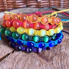 "Handmade 100% Hemp Rainbow Cat's Eye Beaded Bracelet or Anklet you choose your custom color and size.  This is a Unisex, LGBTQIA+ Hemp Jewelry option with a Boho Hippie Jewelry vibe. This is a great gift Idea for him and for her. Please choose your custom options: 1. Hemp & Bead Color: Choose your bracelet color option from the drop menu 2. Choose your size: Choose a size that is best for you from the drop menu. 3. Closure: Choose your closure option by viewing the closure option picture and leaving me a message in the \"personalization text box.\" ABOUT: Sustainable Style: Our hemp jewelry is crafted with love and care using all-natural, eco-friendly hemp fibers. By supporting our handmade creations, you're not only wearing a fashion statement, but you're also making a positive impact on Hippie Skater Style, Knit Slouchy Hats, Crochet Slouchy Hat, Hemp Bracelet, Hemp Jewelry, Hemp Necklace, Hemp Bracelets, Recycled Glass Bead, Rainbow Cat