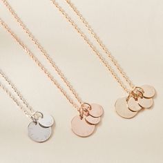 Together wherever you go. Cherish your loved ones in a singular necklace with our Personalized Family Name Necklace. Choose up to 3 mini discs to personalize with the names of little ones or siblings, and pair alongside a personalized medium disc with the name of a cherished mama or papa.&nbsp;18K Champagne Gold Plated, 925 Sterling Silver or 18K Rose Gold PlatedCharm size: Small Flat Disc: 0.6 x 0.6, Mini Flat Disc: 0.4x0.4Secure clasp fasteningCharms are removable from this chain and can b Cherish Your Loved Ones, Small Flat, Engraved Necklace, Champagne Gold, Family Name, Personalized Family, Hand Engraving, Name Necklace, Kid Names