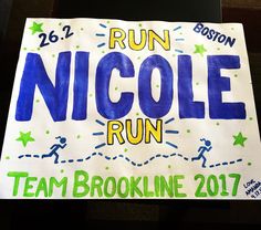 a sign that says run nicole run on it