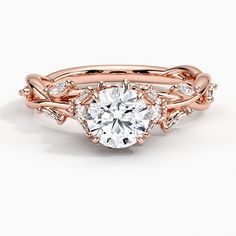 a rose gold engagement ring set with an oval center stone surrounded by small round diamonds