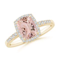 a pink diamond ring with diamonds around it