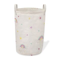 a white storage basket with stars and rainbows on it