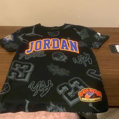 Boys Black And Grey, Orange Blue . Jordan Tees, Jordan Boys, Jordan Logo, Adidas Track Suit, Jordan Shirts, Jordan Red, Nike Boy, Kids Jordans, Newest Jordans