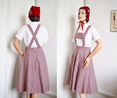 Such a pretty and useful pinafore dress <3  Homemade, probably in the 1970s but in a 1940s style, even has a 1940s zipper! Perfect to wear over a blouse or sweater. Big pockets at sides.  Measurements: Waist is 70 cm/ 27.55" Length is 70 cm/  27.55"  The suspenders closes with buttons at back and is easy to make both longer os shorter as needed.  Excellent condition. One small reapir at side/back of skirt (see last picture) Dungaree Skirt, 1940s Style, Big Pockets, Skirt Vintage, Pinafore Dress, 1940s Fashion, Dungarees, Vintage Skirt, Suspenders