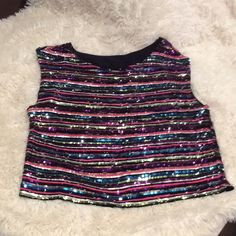 Fully Lined Multicolor Sequined Fancy Top. Sleeveless. Jewel Neckline. Boxy Style Multicolor Sleeveless Tank Top For Party, Multicolor Sleeveless Crop Top For Party, Chic Multicolor Tank Top For Party, Multicolor Party Tank Top, Multicolor Sequined Sleeveless Top, Multicolor Sleeveless Sequined Top, Chic Multicolor Tops For Party, Chic Multicolor Sequined Tops, Sleeveless Black Crop Top For Party