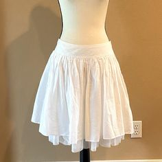 Nwt Gap White Flowy Skirt. Size M. Spring Cotton Skirt By Gap, White Full Skort With Lined Skirt, White Full Skirt Skort With Lining, White Full Skirt Lined Skort, Pleated Mini Skirt For Daywear, Gap Cotton Summer Skirt, Summer Cotton Skirt By Gap, Gap Cotton Skirt For Summer, Gap Bottoms For Daywear In Summer