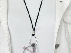 Save that annoying hunt for your glasses and prevent your expensive sunglasses from being lost! This versatile glasses holder necklace is also wonderful as a necklace alone.  An oval shape silver-plated open loop is the focal point of this charming eyeglass holder necklace. A beautifully detailed Bail-style Tibetan silver bead holds the pendant securely. Your glasses are held vertically, ready when you need them.  This is a fashionable, stylish way to always have your glasses handy! This versatile, go-with-everything eyeglass chain features a comfortable high-quality vegan suede black cord. There is an antiqued silver-plated lobster claw clasp in the back with silverplated end caps for the cord. Choose your around-the-neck cord length from the dropdown menu considering the versatile OVAL R Trendy Everyday Glass Necklaces, Glasses Holder Necklace, Expensive Sunglasses, Eyeglass Holder Necklace, Sunglasses Holder, Silver Sunglasses, Glasses Holder, Sunglass Holder, Eyeglass Chain