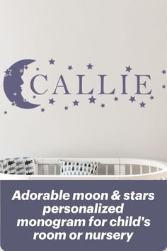 a child's nursery room wall with the name and stars on it, above a crib