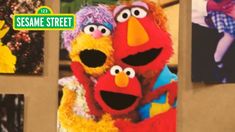 the sesame street characters are posing for pictures