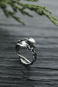 ITEM DESCRIPTION: Weight - 3 g. Materials: silver 925 I can make it any size you want - just mark your size in the order Strawberry is a beautiful berry not only for dessert but also for jewelry. So I made this silver ring with a berry, a flower, and a strawberry leaf. It is so elegant, elegant and joyful, like the beginning of summer in the garden. I am sure that with this ring you will always have a good mood and many compliments. This handmade ring will come to you in a gift box - ready for g Nature-inspired Silver Ring Stamped 925, Nature-inspired Sterling Silver Ring, Nature-inspired Sterling Silver Ring Stamped 925, Silver Open Ring Nature-inspired, Nature-inspired Silver Open Ring, Dainty Silver Jewelry With Rose Cut Diamonds, Fine Silver Hand Forged Rings, Nature-inspired Round Flower Ring For Anniversary, Nature-inspired Silver Rings For Anniversary