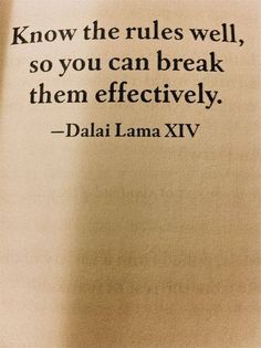 an old book with a quote from dali lamaa xiv