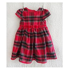 Red plaid vintage style girl dress Plaid Cotton Dress For Winter, Cute Plaid Short Sleeve Dress, Red Fall Dress For Dress-up, Red Dress For Fall Dress-up, Plaid Dress For Christmas Holiday, Plaid Dresses For Fall Holiday, Vintage Plaid Dress For Winter, Fitted Plaid Holiday Dress, Vintage Plaid Winter Dress