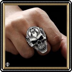 Metal is .925 Sterling Silver Sizes are 9 to 13 US. By Order. Weight: 35 Grams (Size 10)  Our New Custom Heavy Biker Memento Mori Biker Tattoo Skull Ring is a unique design to say the least. One of the best carved rings of this style around and this one is nice and "heavy" at OVER a troy ounce. Very well carved and completely handcrafted with Polished finish and antiqued low areas to show the detail. Can make it satin if you prefer. Let us know at purchase time. Just perfect for those into heavy Silver Skull Print Jewelry For Streetwear, Silver Engraved Jewelry For Biker Events, Silver Jewelry With Skull Print For Streetwear, Silver Skull Ring Collectible, Silver Skull Ring For Halloween Streetwear, Silver Skull Ring For Biker Events And Halloween, Silver Biker Jewelry For Streetwear, Collectible Symbolic Skull Ring Stamped 925, Silver Skull Biker Jewelry