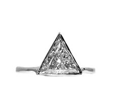 a white gold ring with a triangle cut diamond