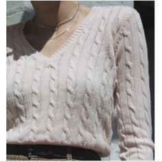 Brandy Melville V-Neck Cable Knit Sweater In Light Pink. A Classic V-Neck And Cable Knit Construction Give This Slouchy Sweater A Relaxed, Weekend Vibe. Keep It Easy Going In A Cozy Pullover Sweater. - Cotton Blend - V- Neckline - Long Sleeves - Pullover Style - This Knit Material Offers A Moderate Stretch - One Size (Xs-M In My Opinion) Trendy V-neck Cable Knit Cardigan, Cozy Fine Knit V-neck Tops, Cozy V-neck Fine Knit Tops, Spring Cable Knit V-neck Sweater, Elegant V-neck Knit Top For Winter, Chic V-neck Fine Knit Sweater, Fitted Knitted V-neck Sweater, Pink V-neck Knit Top, Fitted V-neck Knit Sweater