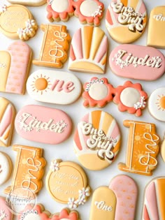 decorated cookies are displayed on a white surface