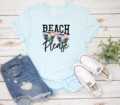 Summer Graphic Tee! Beach please the ocean is calling! This is a fun graphic you or family/friends can wear on your next vacation. Available is a variety of sizes and colors. This cute summer beach please tee is a must. We use a high-quality unisex t-shirt that is insanely soft. In fact, it will be one of the softest, best fitting, most comfortable shirts you've ever owned. Beach Please Shirt Design. Design is created using a water based ink that are heat pressed into the fabric. CLICK BELOW htt Beach Please Shirt, Fun Beach Party T-shirt With Letter Print, Blue Summer Shirt With Funny Text, Summer Blue Shirt With Funny Text, Blue Funny Text Shirt For Summer, Blue Shirt With Funny Text For Summer, Relaxed Fit T-shirt For Family Beach Vacation, Casual Letter Print Shirt For Family Vacation, Casual Shirt With Letter Print For Family Vacation