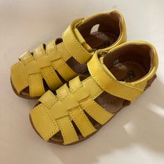 Beautiful, Never Worn Naturino See“ Semi-Closed Leather Sandals In Yellow. Eu Size 24 Which Is Us Size 7.5 According To The Brand‘s Sizing Chart: Https://Www.Naturino.Com/Shop/Us_en/Sandales-Semi-Fermee-En-Cuir-Jaune-Naturino-See.Html Cute Summer Sandals With Rubber Sole, Spring Non-slip Sandals With Round Toe, Casual Yellow Leather Sandals, Playful Closed Toe Sandals With Soft Sole, Cute Leather Sandals With Round Toe, Adjustable Yellow Sandals With Buckle Closure, Casual Sandals With Rubber Sole For Playtime, Yellow Adjustable Sandals With Round Toe, Summer Playtime Sandals With Round Toe