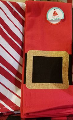 there is a red and white striped cloth with gold sequins in the pocket