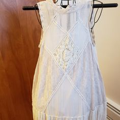 Free People One Angel Dress Romantic Lace Dress/Tunic Very Rare. Size Medium. Distressed Look. Open Diamond Back. Unique Lace Design. Sleeveless Angel, Closure: Button Neckline: Mock Neck Size: M Color: Ivory Material: 100% Cotton Fabric Type: Lace Accents: Crochet, Lace Dress Length: Short Size Type: Regular Style: A-Line, Mini Features: Lined Distressed Dress, Crochet Lace Dress, Angel Dress, Romantic Lace, Dress Tunic, Dress Lace, Lace Design, Color Ivory, Free People Dress