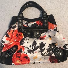 Balenciaga Floral Purse In Good Used Condition. Designer Black Bags For Spring, Designer Satchel Shoulder Bag For Spring, Designer Shoulder Bag For Spring Travel, Designer Spring Shopping Bag, Designer Bags For Spring Errands, Chic Multicolor Bag With Branded Hardware, Designer Bags With Handles For Spring, Designer Spring Shopping Shoulder Bag, Designer Bags For Everyday Use In Spring