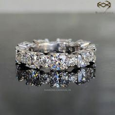 an image of a wedding ring with diamonds on it