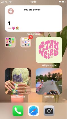 an iphone screen with various stickers on it