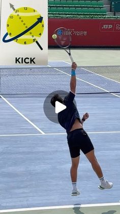 a woman hitting a tennis ball with a racquet on top of a court