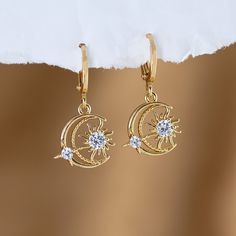 "Moon and Star Pave Huggie Earrings, Gold Diamond Dangle Earrings, Celestial Jewelry. Perfect Gift for Her, 21st birthday gift for her ✨These earrings feature a charm of your choice hanging from a dainty 18k Gold Plated huggie hoop. These hoops are sold as SINGLES, or by PAIRS - both options are available to select from the 2nd drop down menu. Mix & match these earrings to create fun and unique pairs! * Bezeled Moonstone Hoop Available to Purchase HERE: https://www.etsy.com/listing/1253212496/ * Celestial Round Crystal Earrings As Gift, Celestial Round Crystal Earrings For Gift, Celestial Star-shaped Crystal Earrings For Gift, Celestial Star-shaped Crystal Earrings Gift, Celestial Star-shaped Crystal Earrings, Hypoallergenic Celestial Round Earrings, Celestial Star Charm Round Earrings, Celestial Style Drop Earrings, Celestial Earrings With Star Charm As Gift